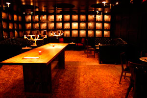 La Biblioteca - 120 reception <br> Shelves of Tequila, rich leather banquettes and lounge tables create an exclusive ambiance for cocktails and Latin-Asian cuisine.