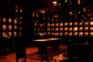 Stacks - 70 reception <br> Over 400 bottles fill the shelves in the stacks, perfect for a cocktail reception or any large gathering.