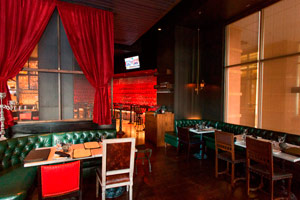 The Study - 25 seated | 35 reception <br> Complete with tufted leather sofas & marble table tops, guests will enjoy drinks & dining with views of the Millennium Bridge.