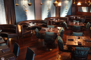 Elevated Dining Room - 55 seated | 65 reception<br />This semi-private Elevated Dining Room, hidden behind layers of delicate, flowing curtains, is the most secluded area of the restaurant - perfect for a business lunch